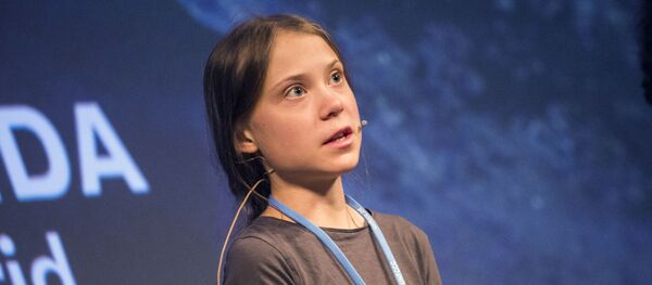 Шведская школьница Грета Тунберг на пресс-конференции перед климатическим протестом Марш за климат в Мадриде. Шведская школьница Грета Тунберг на пресс-конференции перед климатическим протестом Марш за климат в Мадриде. - Sputnik Таджикистан