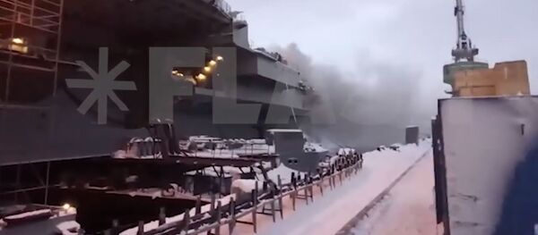 Как тушат пожар на крейсере «Адмирал Кузнецов» в Мурманске - YouTube Как тушат пожар на крейсере «Адмирал Кузнецов» в Мурманске - YouTube - Sputnik Таджикистан