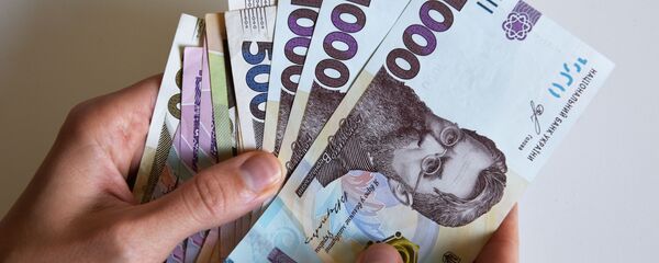 Украинские гривны различного номинала - Sputnik Таджикистан