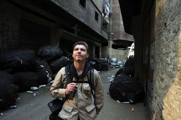 Фотокорреспондент Андрей Стенин на улице Каира - Sputnik Таджикистан