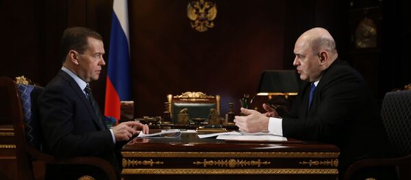 Встреча премьер-министра РФ Медведева с главой ФНС Мишустиным. 2018 год Встреча премьер-министра РФ Медведева с главой ФНС Мишустиным. 2018 год - Sputnik Таджикистан