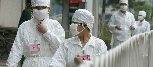 Врачи в Китае - Sputnik Тоҷикистон