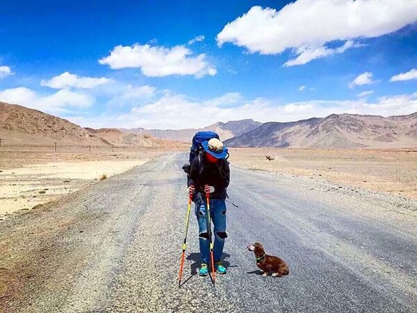 Ба саёҳати дунё бо дучарха ва саг - Sputnik Тоҷикистон