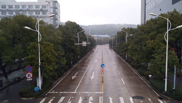 Пустая улица в Ухане, Китай - Sputnik Тоҷикистон