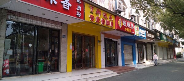 Закрытые магазины в Ухане, Китай - Sputnik Тоҷикистон