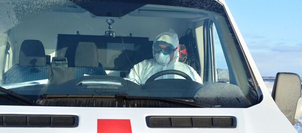 Учения по проведению медицинской эвакуации пациентов с симптомами коронавируса - Sputnik Таджикистан