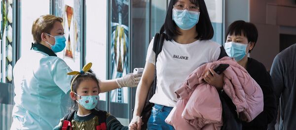 Прибывающие пассажиры из Китая - Sputnik Тоҷикистон