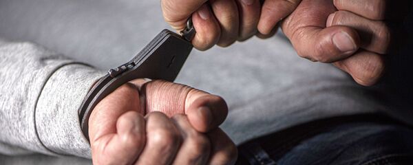 Руки в наручниках. Руки в наручниках. - Sputnik Тоҷикистон