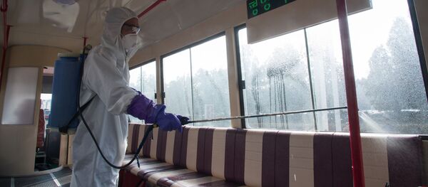 Дезинфекция трамвая против распространения коронавируса в Пхеньяне - Sputnik Тоҷикистон