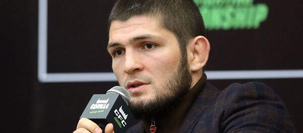  Хабиб Нурмагомедов, боец смешанного стиля, чемпион абсолютного бойцовского чемпионата (UFC) в легком весе - Sputnik Тоҷикистон