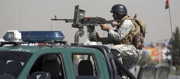 Афганский офицер безопасности Афганский офицер безопасности - Sputnik Тоҷикистон