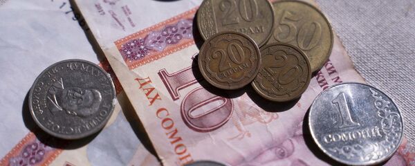 Таджикские деньги, архивное фото Таджикские деньги, архивное фото - Sputnik Тоҷикистон