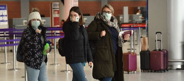Пассажиры в международном аэропорту Львов имени Даниила Галицкого, архивное фото - Sputnik Таджикистан