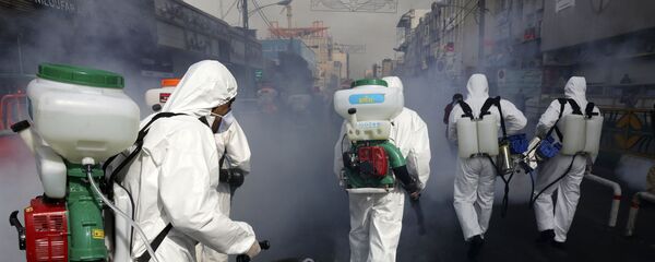 Дезинфекция улиц в Тегеране Дезинфекция улиц в Тегеране - Sputnik Тоҷикистон