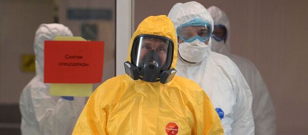 Президент РФ В. Путин посетил больницу в Коммунарке - Sputnik Тоҷикистон