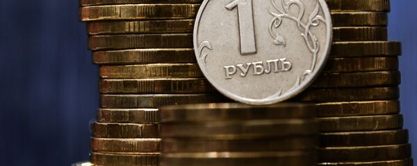 Монеты номиналом один рубль Монеты номиналом один рубль - Sputnik Таджикистан