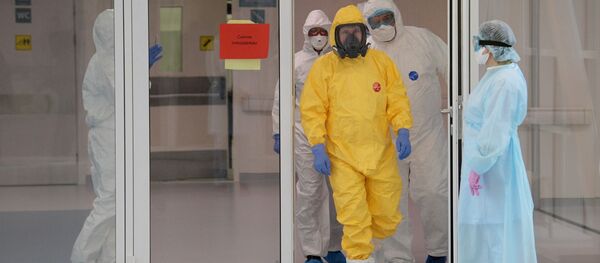 Президент РФ В. Путин посетил больницу в Коммунарке - Sputnik Таджикистан