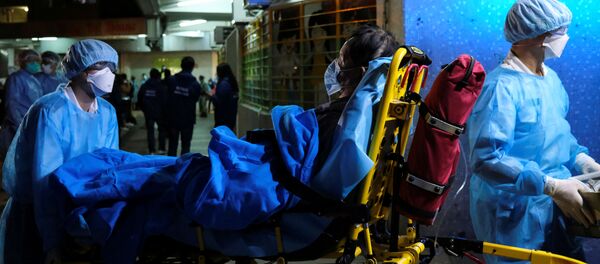 Госпитализация больного с коронавирусом - Sputnik Таджикистан