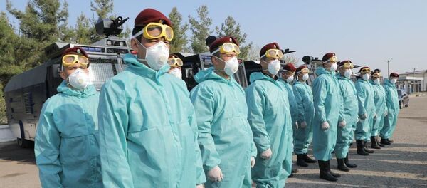 Нацгвардия и сотрудники МВД приступили к дезинфекции улиц Ташкента из-за коронавируса - Sputnik Тоҷикистон