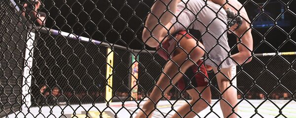 UFC- размикорон дар майдон UFC- размикорон дар майдон - Sputnik Таджикистан