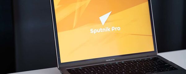 Ноутбук с лого SputnikPro - Sputnik Таджикистан