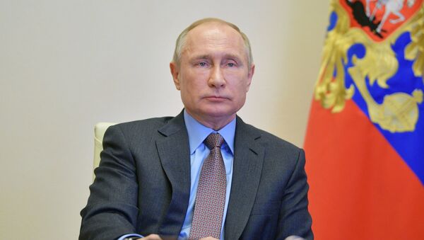 Путин проводит по видеосвязи совещание по ситуации с коронавирусом - Sputnik Тоҷикистон