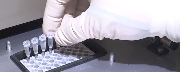 Работа полевой биолаборатории, архивное фото Работа полевой биолаборатории, архивное фото - Sputnik Тоҷикистон