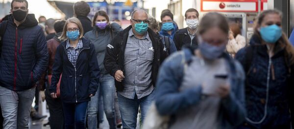 Люди в лицевых масках - Sputnik Тоҷикистон
