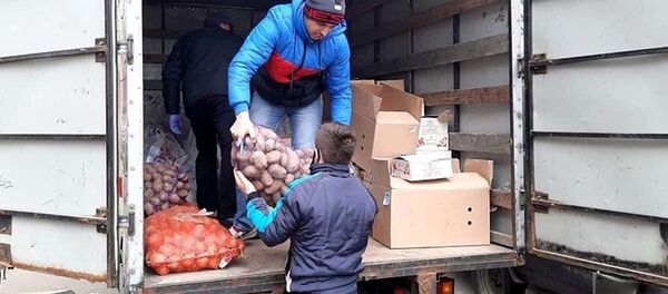 Волонтеры Международного совета помощи мигрантам - Sputnik Таджикистан