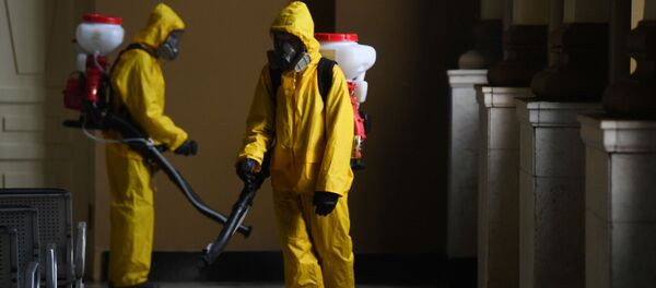 Дезинфекция в помещении в рамках мер по профилактике коронавирусной инфекции. - Sputnik Тоҷикистон