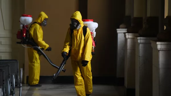 Дезинфекция в помещении в рамках мер по профилактике коронавирусной инфекции. - Sputnik Тоҷикистон