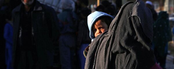 Беженцы из провинции Газни в Афганистане - Sputnik Тоҷикистон