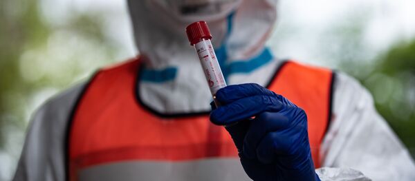 Тест на коронавирус - Sputnik Тоҷикистон