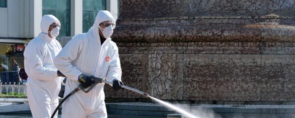 Сотрудники санитарных служб проводят обработку улиц  - Sputnik Тоҷикистон