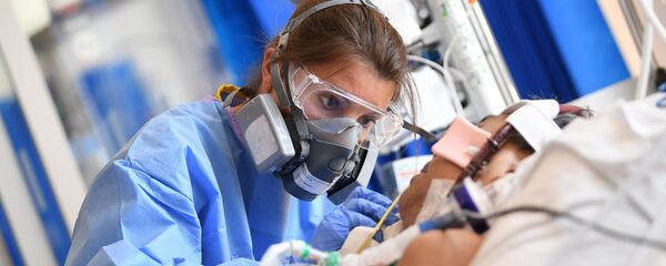 Медсестра ухаживает за пациентами в больнице - Sputnik Тоҷикистон