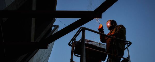 Строитель, архивное фото - Sputnik Тоҷикистон