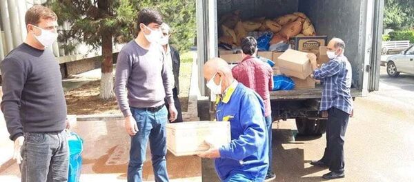 Кумаки Шамсулло Соҳибов ба шаҳри Норак - Sputnik Тоҷикистон