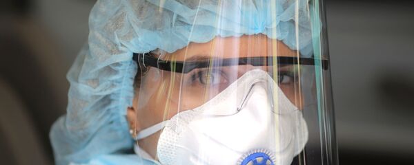 Врач центральной районной больницы - Sputnik Тоҷикистон