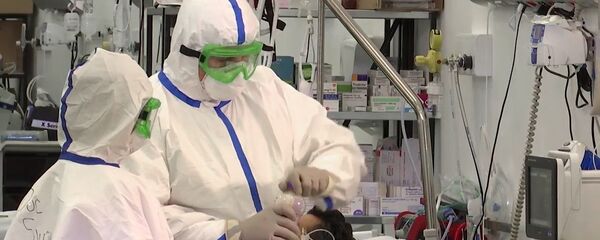 Работа российских военных врачей в полевом госпитале Бергамо Работа российских военных врачей в полевом госпитале Бергамо - Sputnik Тоҷикистон