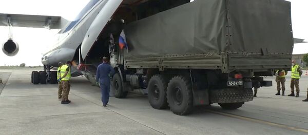 Российские военные специалисты возвращаются из Италии  - Sputnik Тоҷикистон
