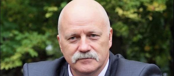 Аналитик группы компаний Финам Алексей Коренев - Sputnik Таджикистан