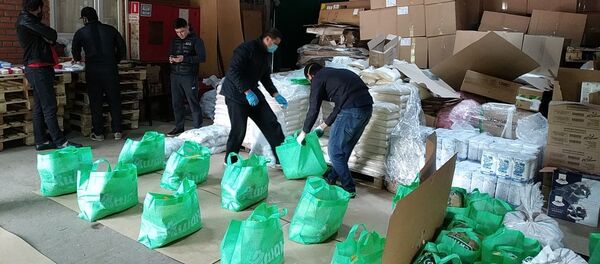 В Москве и Подмосковье нуждающимся мигрантам раздали 55 тонн продуктов - Sputnik Таджикистан