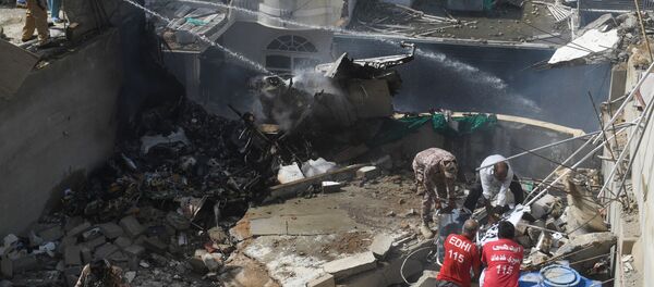 Крушение пассажирского самолета в Пакистане в городе Карачи - Sputnik Тоҷикистон