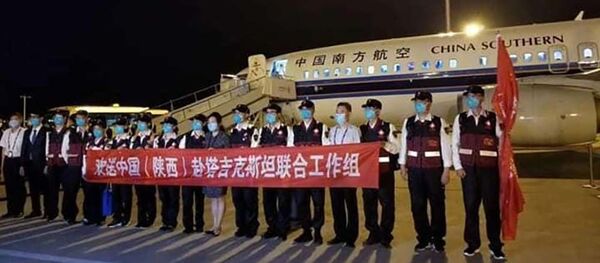 Группа китайских врачей прибыли в Таджикистан - Sputnik Тоҷикистон