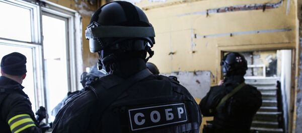 Сотрудники специального отряда быстрого реагирования России Сотрудники специального отряда быстрого реагирования России - Sputnik Таджикистан