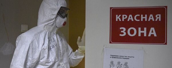 Медицинский работник в госпитале, архивное фото - Sputnik Тоҷикистон