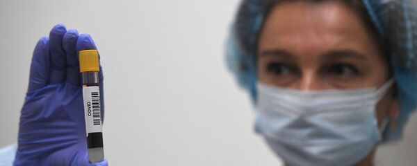 Тестирование на наличие антител к COVID-19, архивное фото - Sputnik Тоҷикистон