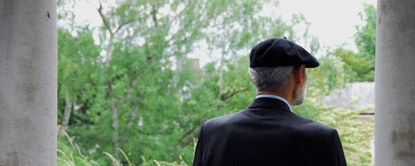 Пожилой мужчина в кепке Пожилой мужчина в кепке - Sputnik Таджикистан