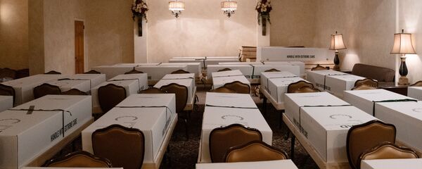 Гробы умерших от коронавируса, архивное фото Гробы умерших от коронавируса, архивное фото - Sputnik Тоҷикистон