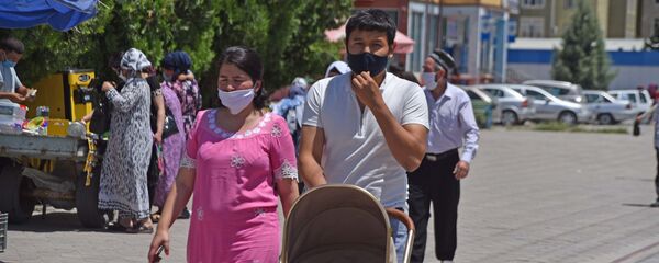 Люди в защитных масках - Sputnik Тоҷикистон